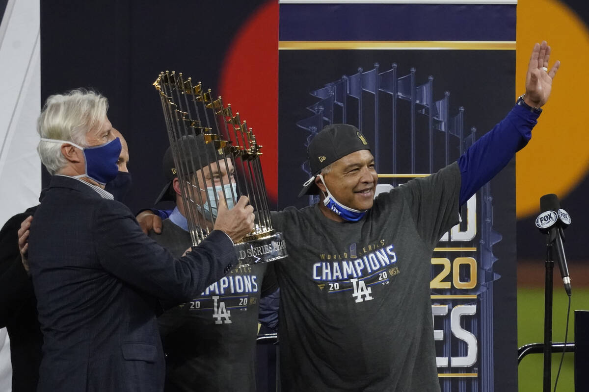 In this Oct. 27, 2020, file photo, Los Angeles Dodgers manage Dave Roberts celebrates with the ...