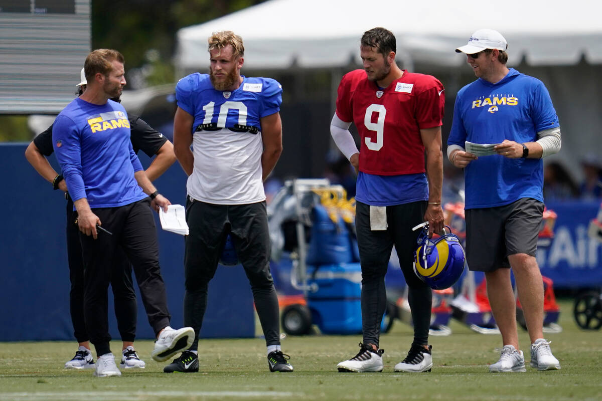 Los Angeles Rams head coach Sean McVay, left, wide receiver Cooper Kupp (10), and quarterback M ...